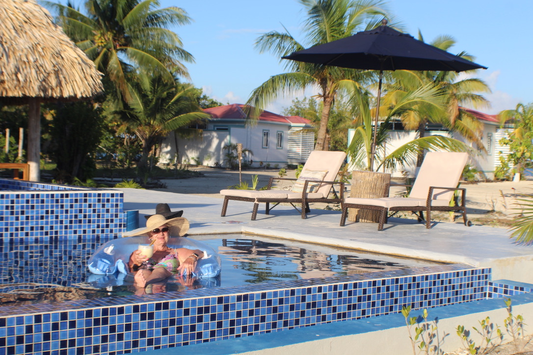 Relaxing By The Pool At Blue Reef Island In Belize